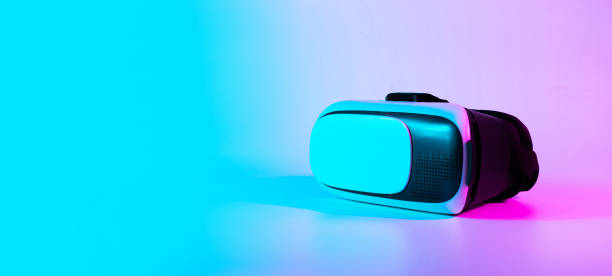 istock VR glasses virtual reality. 3d digital headset on futuristic neon tech background. Future Modern technology concept. VR gaming. 1369381185