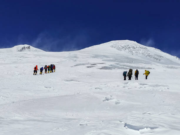 istock A group of climbers climbs the snowy mountain Elbrus 1369381596