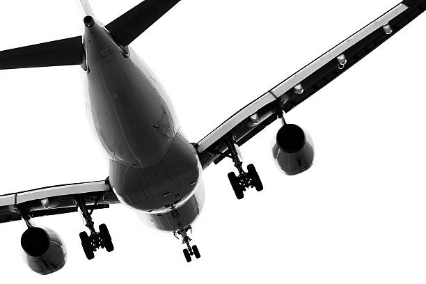 istock jet airplane landing on white background 136938334
