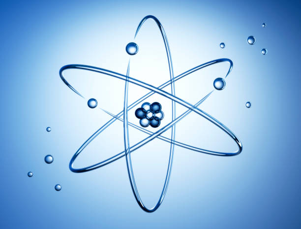 Atom nucleus with electrons Atom nucleus with electrons on blue background - 3D illustration nucleus stock pictures, royalty-free photos & images