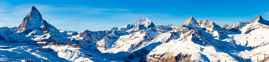 Panoramic view to the majestic Matterhorn mountain in winter, Valais, Switzerland