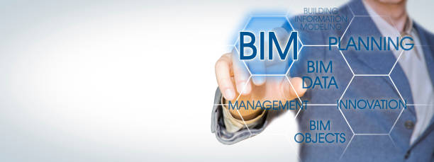 Building Information Modeling - BIM - a new way of architecture designing - Concept with business manager pointing to icons against a digital display and copy space Building Information Modeling - BIM - a new way of architecture designing - Concept with business manager pointing to icons against a digital display and copy space building information modeling photos stock pictures, royalty-free photos & images