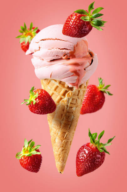 istock Strawberry ice cream in waffle cone. 1369390805