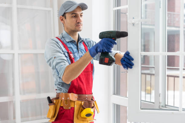 istock The worker installing and checking window in the house 1369393975