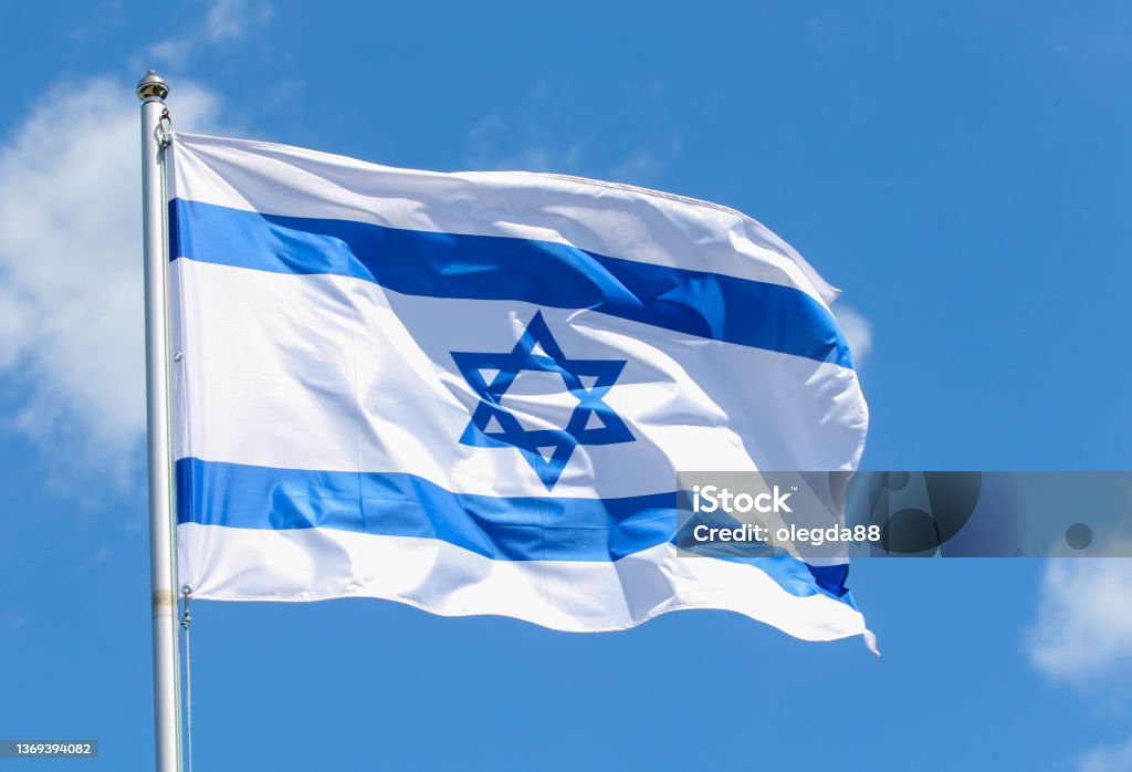 Israel Israel flag on blue sky background Israeli Flag Stock Photo