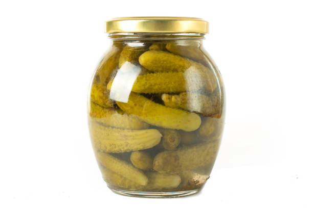 istock canned cucumbers on a white background in a glass jar 1369397976