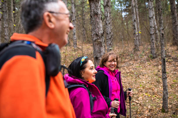 istock Seniors having fun hiking 1369398256