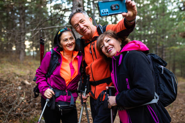 istock Senior hikers taking a selfie 1369398284