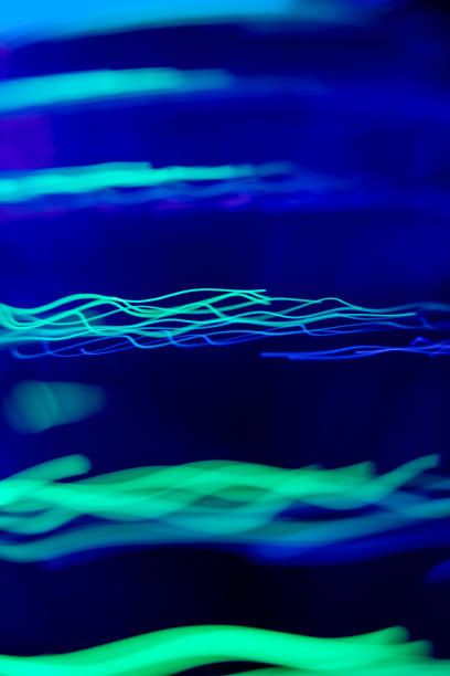 Abstract defocused striped background made of fiber optics