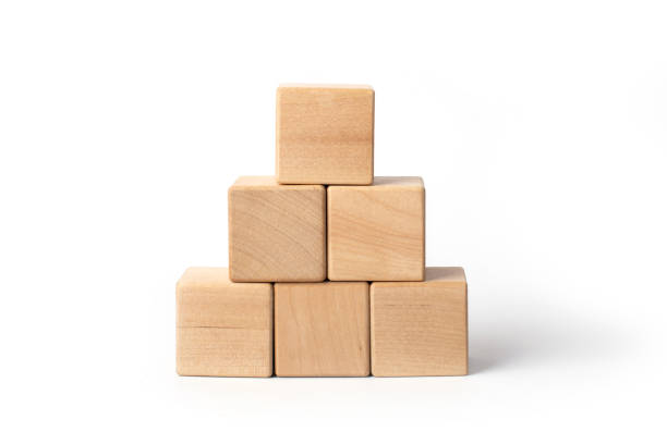 istock wooden toys on a white background, cubes 1369401096