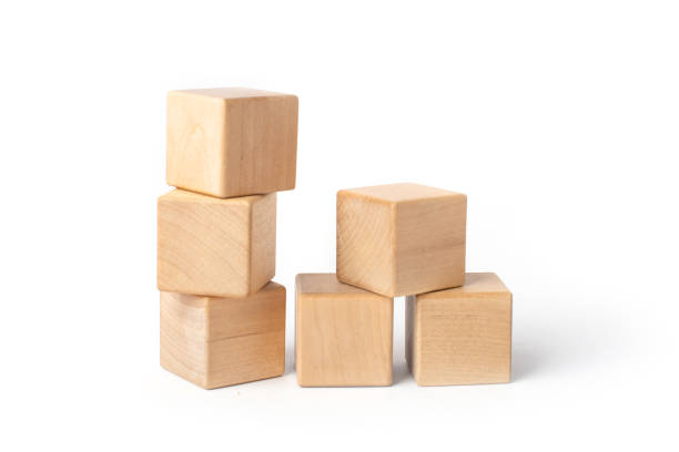 istock wooden toys on white background, cubes 1369401142