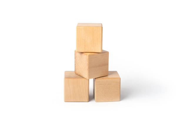 istock wooden toys on white background, cubes 1369401167