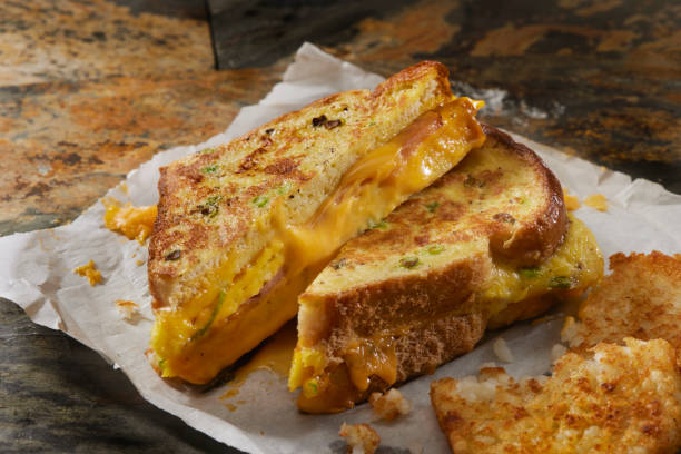 the french toast omelette sandwich - cheese sandwich imagens e fotografias de stock