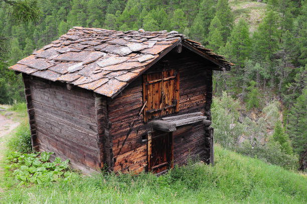 istock Old wooden private house. 1369405689
