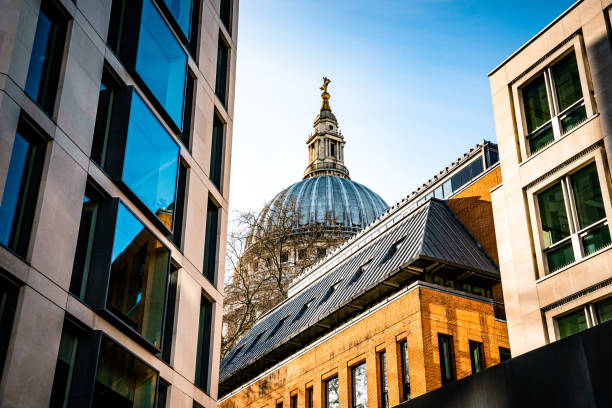 t Paul's Cathedral between buildings, London, UK.