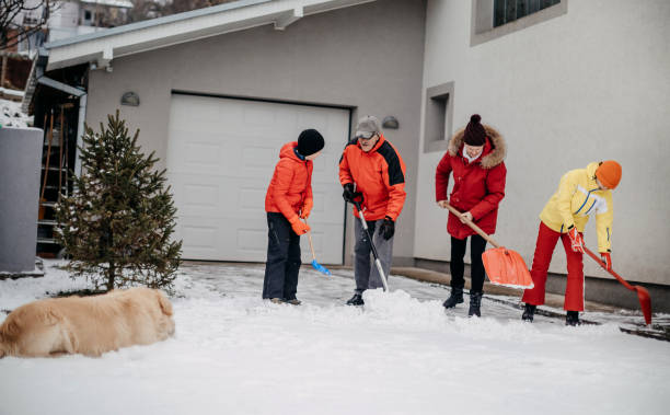 istock Family cleaning snow 1369406864