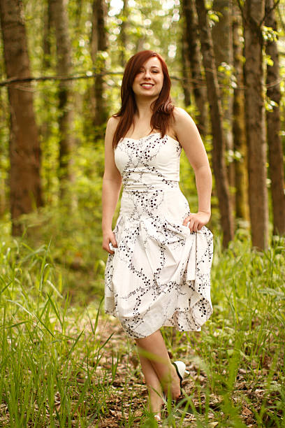 istock Young woman in the woods 136940717
