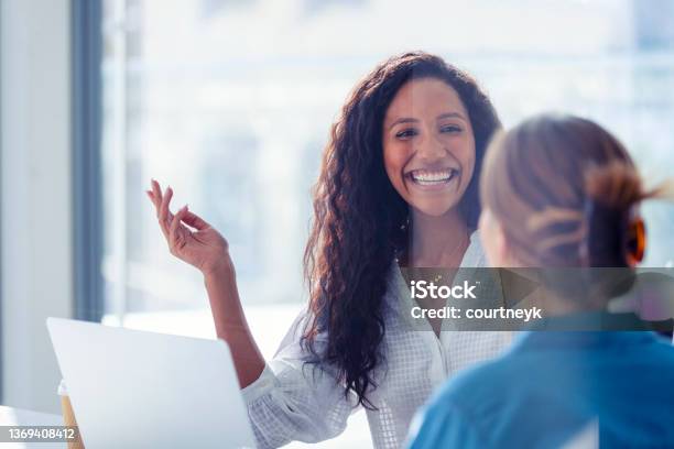 Business Colleagues Having A Conversation Stock Photo - Download Image Now - Business, Advice, Happiness