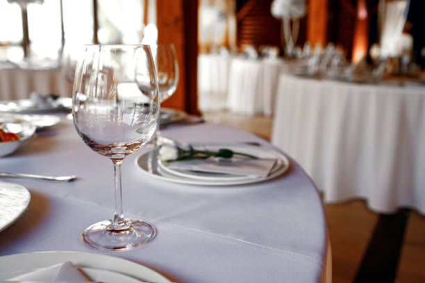 istock catering table set service with silverware, napkin and glass at restaurant before party 1369412498
