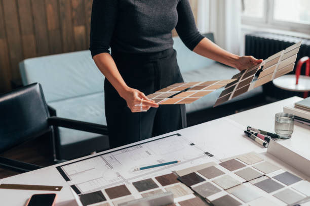 Anonymous Female Architect Choosing the Right Color Palette for her Project