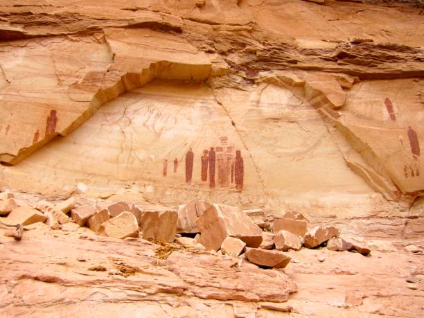 The Great Gallery in Horseshoe Canyon April sunset at The Great Gallery, a single panel approximately 200 feet long with dozens of images. The panel is believed to be thousands of years old and was created during the late archaic period. Horseshoe Canyon in Utah contains one of the finest displays and best preserved prehistoric Indian rock art in the United States. Located in a detached unit of Canyonlands National Park, this area was added to the park in 1971 to protect this amazing collection of rock art. canyonlands national park stock pictures, royalty-free photos & images