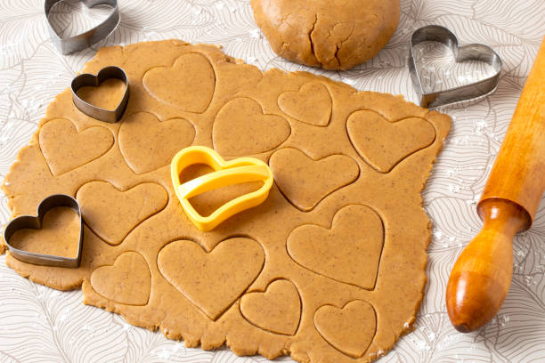 istock Making heart-shaped gingerbread for Valentine's Day 1369420422