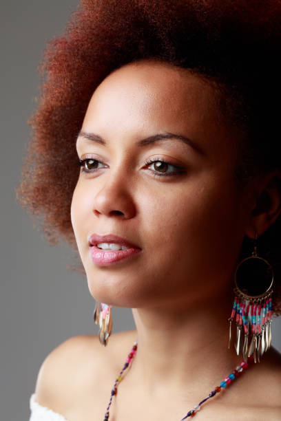 istock Sensual young Black woman looking aside with parted lips 1369421965