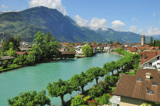 City streets along the river. Interlaken. Swiss Alps.