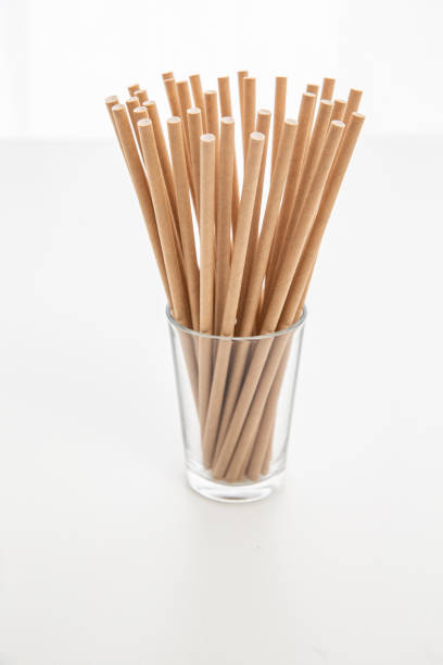istock Organic single-use paper straws, sustainability concept 1369436778