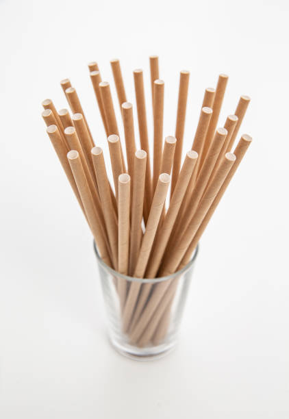 istock Organic single-use paper straws, sustainability concept 1369436785
