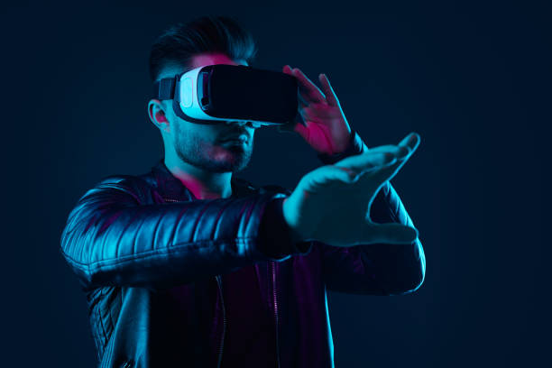 istock Gamer in VR headset exploring virtual world 1369437925