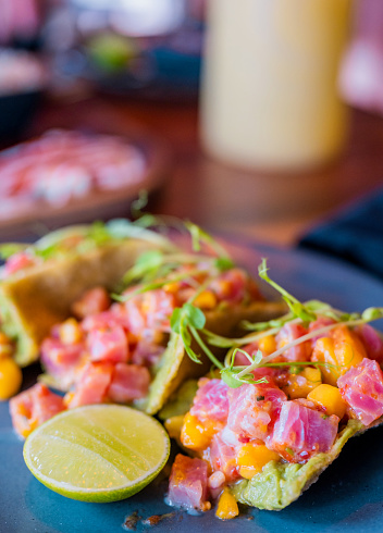 Tuna ceviche with fresh mango chopped salsa and avocado.