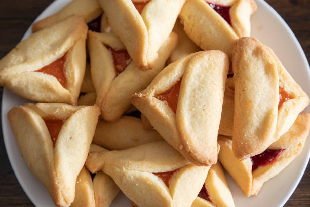 istock Hamantaschen   / Hamantash on a plate - Purim Celebration 1369439752