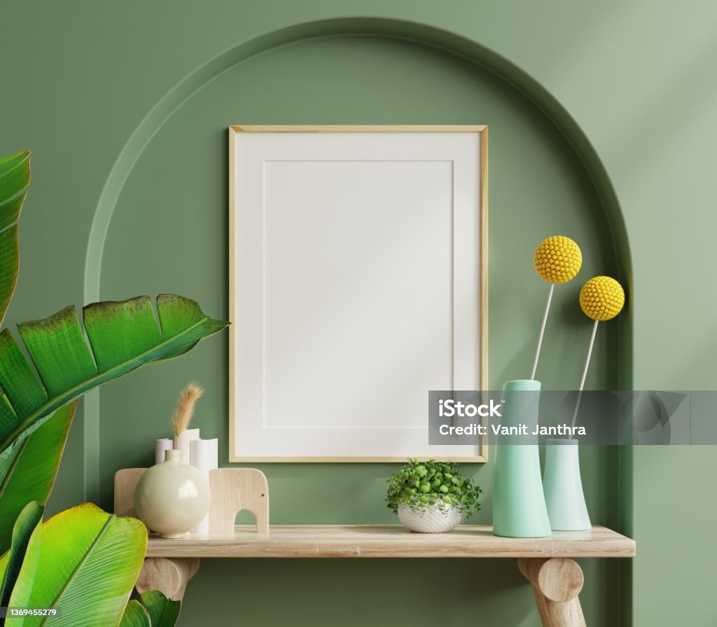 Interior wooden frame mockup on shelf behind the green wall. Interior wooden frame mockup on shelf behind the green wall.3D rendering Flower Stock Photo