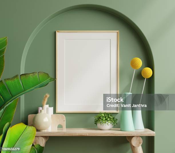 Interior Wooden Frame Mockup On Shelf Behind The Green Wall Stock Photo - Download Image Now