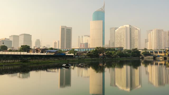Jakarta skyline with skyscrapers on lakeside
