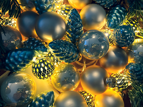 Golden Christmas decoration made of balls and light.