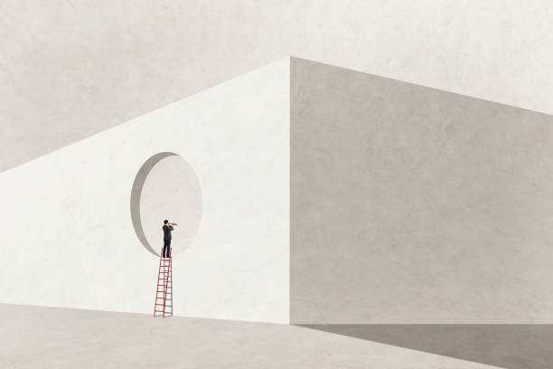 istock Man Looking Through A Spyglass 1369468860