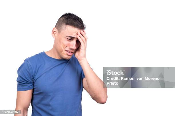 Man With His Hand On His Head Crying Stock Photo - Download Image Now - Men, White Background, Worried