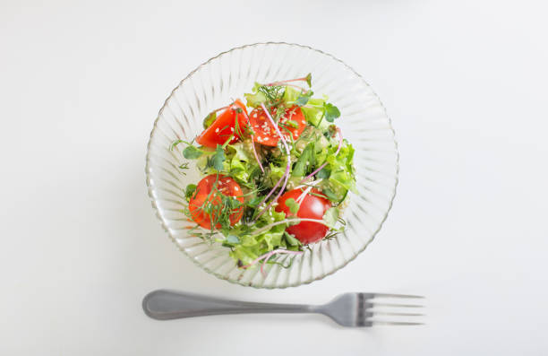 istock healthy vegetarian salad on white table 1369479525