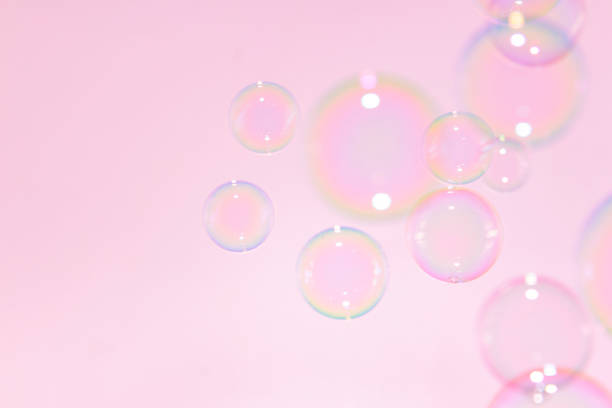 istock Beautiful Transparent Pink Soap Bubbles Texture Background. 1369481290