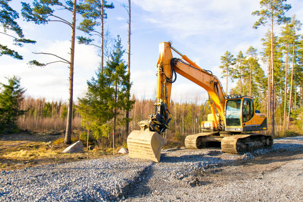 istock Yellow excavator building a road 1369482791