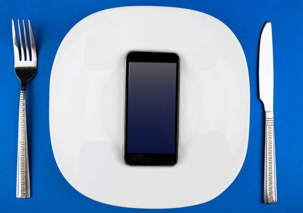istock Phone in the Plate 1369487451
