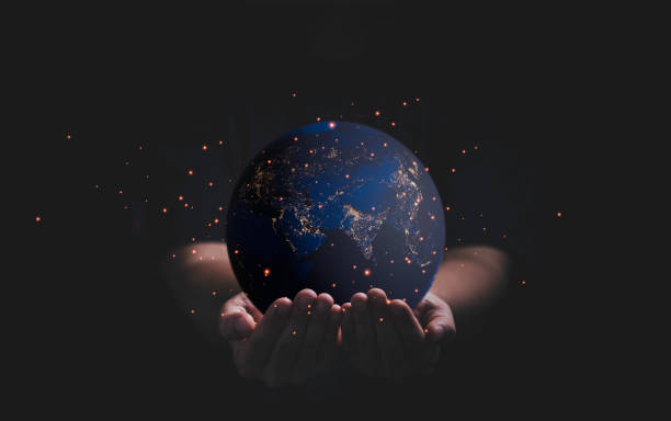 istock Man holding planet by two hands for earth day and saving energy environment concept ,Element of this image from NASA and 3d render. 1369488353