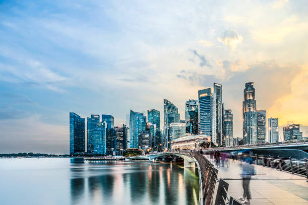 istock Singapore Skyline at Marina Bay at sunset 1369488568