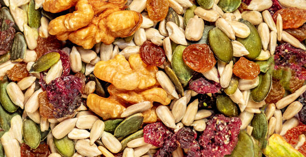 istock Nuts, seeds and dried fruits as a  background. Flat lay. Top view. Pattern 1369490744