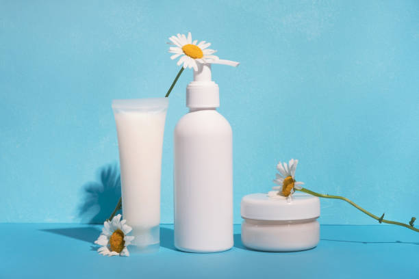 istock Still life natural organic cosmetics with sunlight shadows. 1369492048