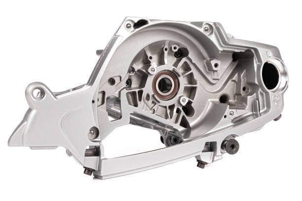 new modern crankcase for chainsaw on white isolated background.
