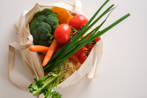 istock Vegetables in reusable textile shopping bag 1369497803