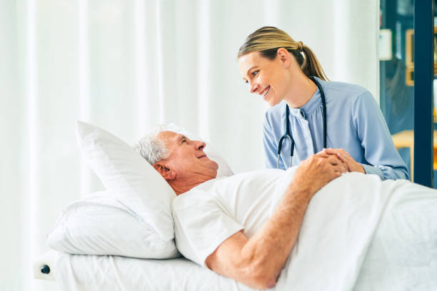 istock Shot of a doctor visiting her elderly patient 1369498321
